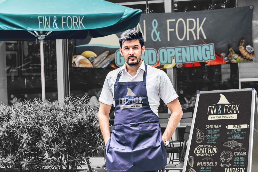 Fin & Fork seafood grill branding and signage